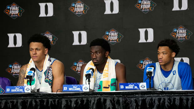 Duke’s Paolo Banchero, left, Mark Williams, center, and Wendell Moore Jr. listen to a question during a news conference at the men’s Final Four NCAA college basketball tournament Thursday, March 31, 2022, in New Orleans. North Carolina will play Duke Saturday.